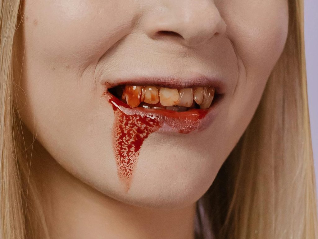 Sonhar com Sangue na Boca