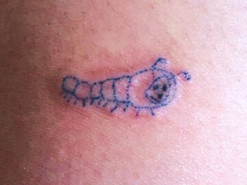 Thumbnail Sonhar com Tatuagens Feias